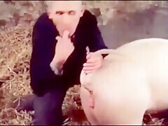 My husband warms up his cock before with the pig